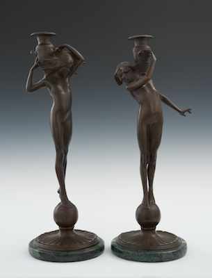 Appraisal: A Pair of Cast Bronze Candlesticks After E F McCartan