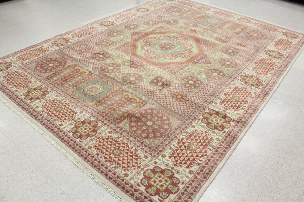 Appraisal: HAND KNOTTED ORIENTAL CARPET Indo-Persian contemporary overall flower-filled geometric medallions