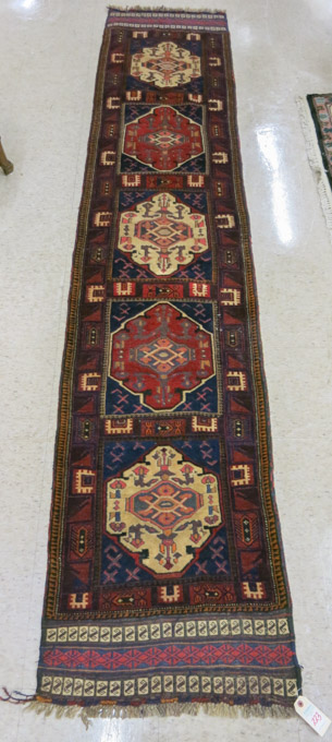 Appraisal: A BELOUCHI TRIBAL RUNNER mixed hand knotted pile and flatweave