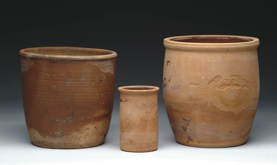 Appraisal: THREE REDWARE JARS cylinder jar with lip brown glaze interior