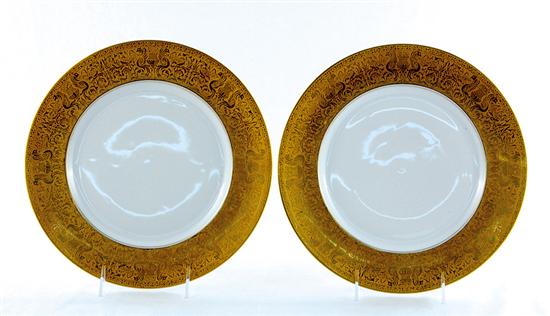 Appraisal: Set Heinrich Co porcelain plates wide molded and etched gold