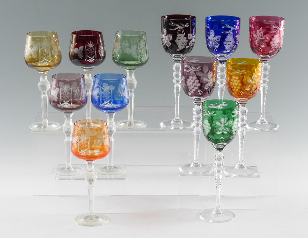 Appraisal: BOHEMIAN CUT TO CLEAR STEMWARE GOBLETS multicolored stems in similar