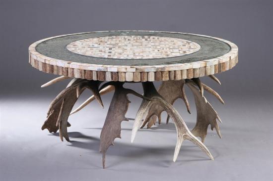 Appraisal: RUSTIC STYLE CIRCULAR LOW TABLE late th century With medallion