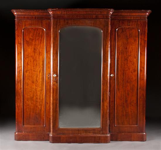 Appraisal: George IV mahogany three-door wardrobe circa center section with mirrored