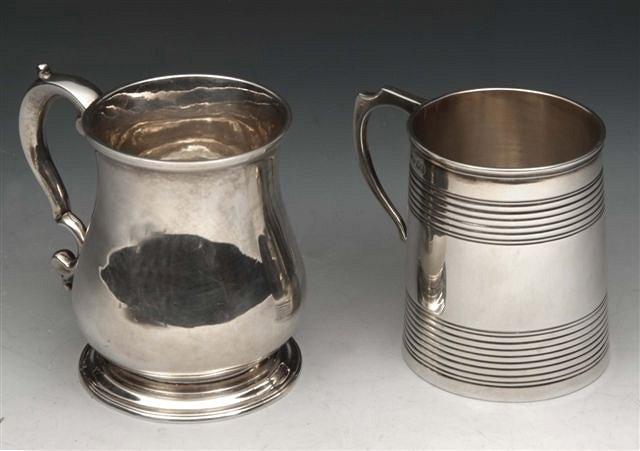 Appraisal: A GEORGE III SILVER BALUSTER SHAPED TANKARD on turned stepped