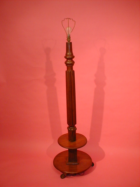 Appraisal: A Victorian mahogany standard lamp converted from a bedpost