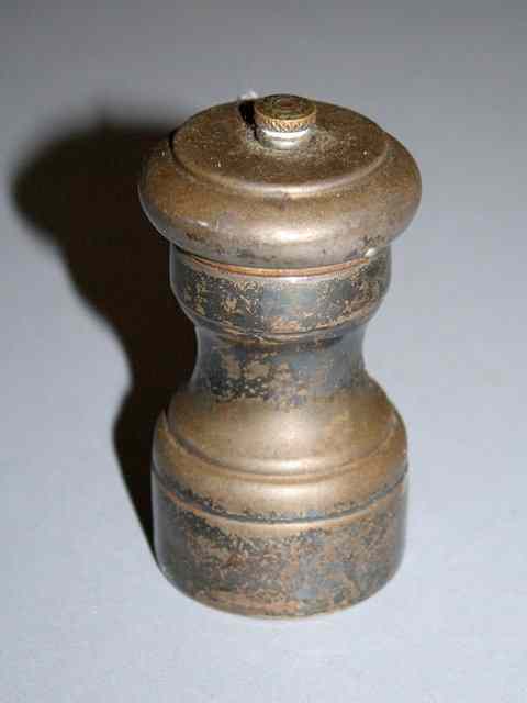 Appraisal: A SILVER PEPPER GRINDER of waisted form high stamped Sterling