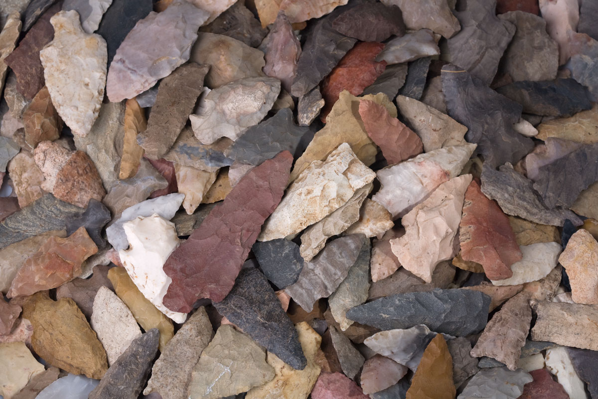 Appraisal: EXTENSIVE LOT OF AMERICAN INDIAN CHIP-CARVED ARROWHEADS