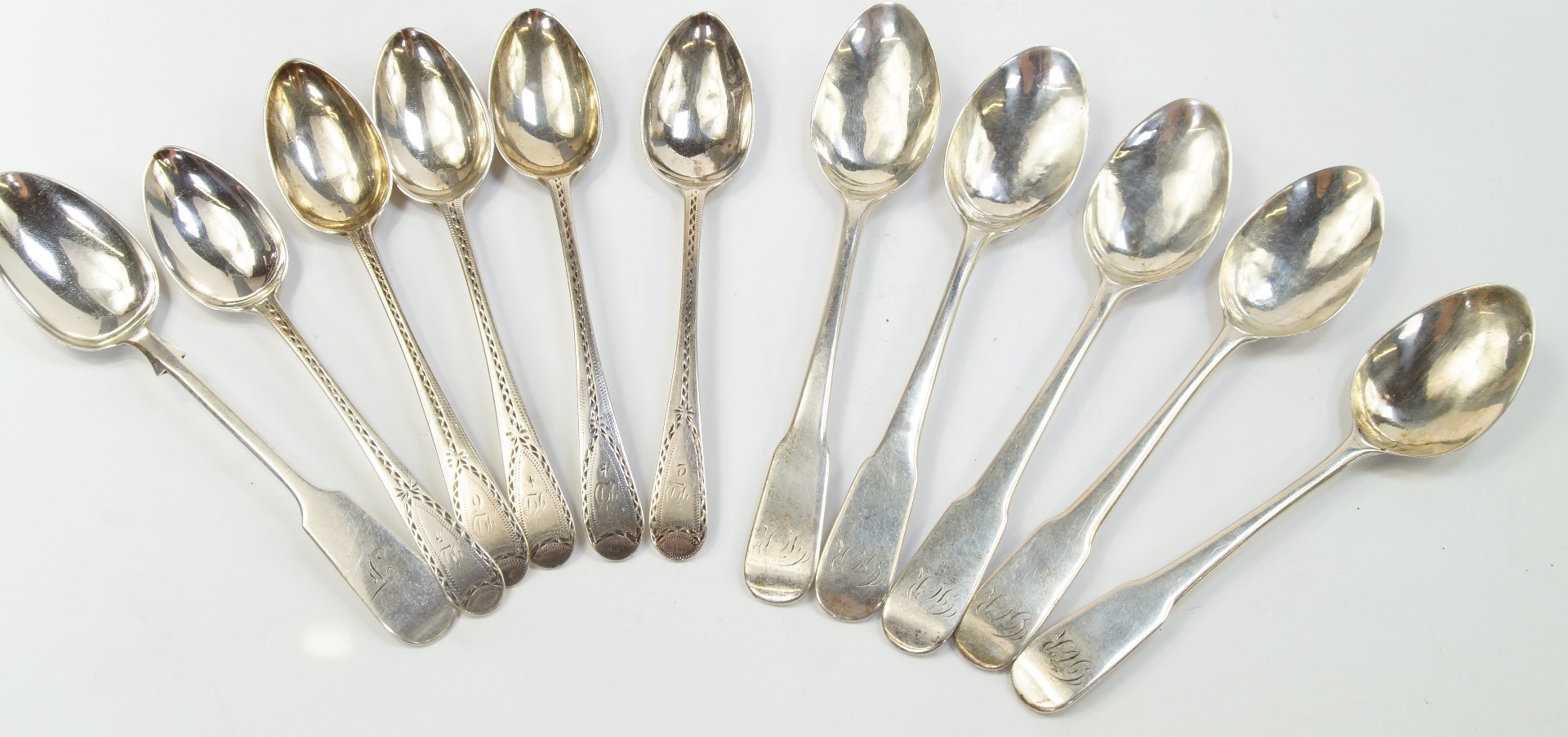 Appraisal: A set of eleven Victorian silver teaspoons decorated in the