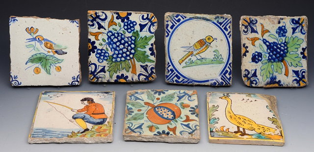 Appraisal: A COLLECTION OF SEVEN DELFT TILES with polychrome figure and