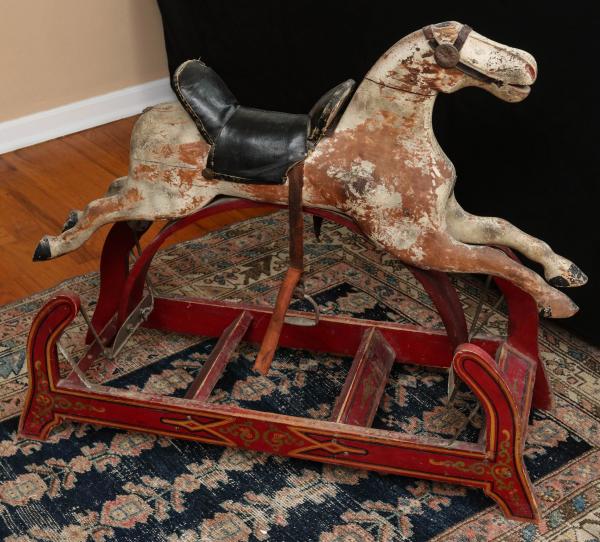 Appraisal: A FOLKY TH C AMERICAN SWING HORSE IN OLD PAINTThe