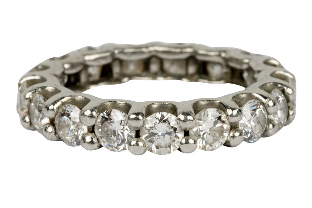 Appraisal: PLATINUM DIAMOND ETERNITY BANDcontaining full cut diamonds H-I SI weighing