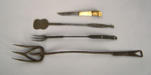 Appraisal: Three wrought iron kitchen utensils two marked DTR Seagraves together