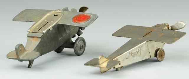 Appraisal: TWO AIRPLANE STILL BANKS Pressed steel and die cast includes