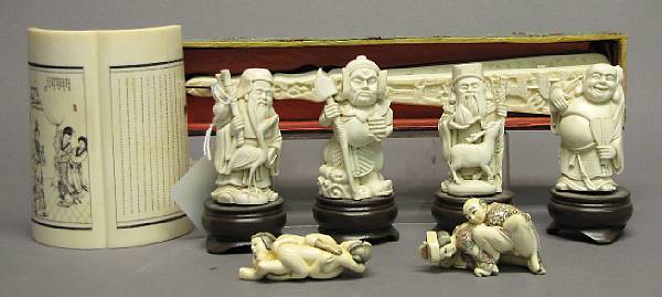 Appraisal: A group of twelve Chinese and Japanese style ivory carvings