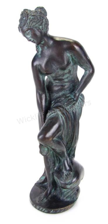 Appraisal: Bronze Female Figure depicting semi-nude female figure standing on rocks