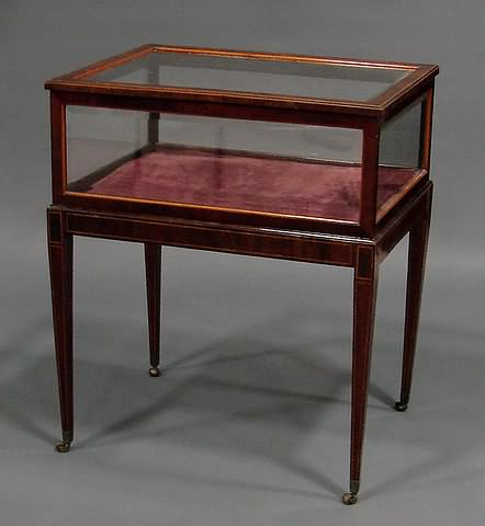 Appraisal: Lift lid top glazed sides all glass beveled line-inlaid apron