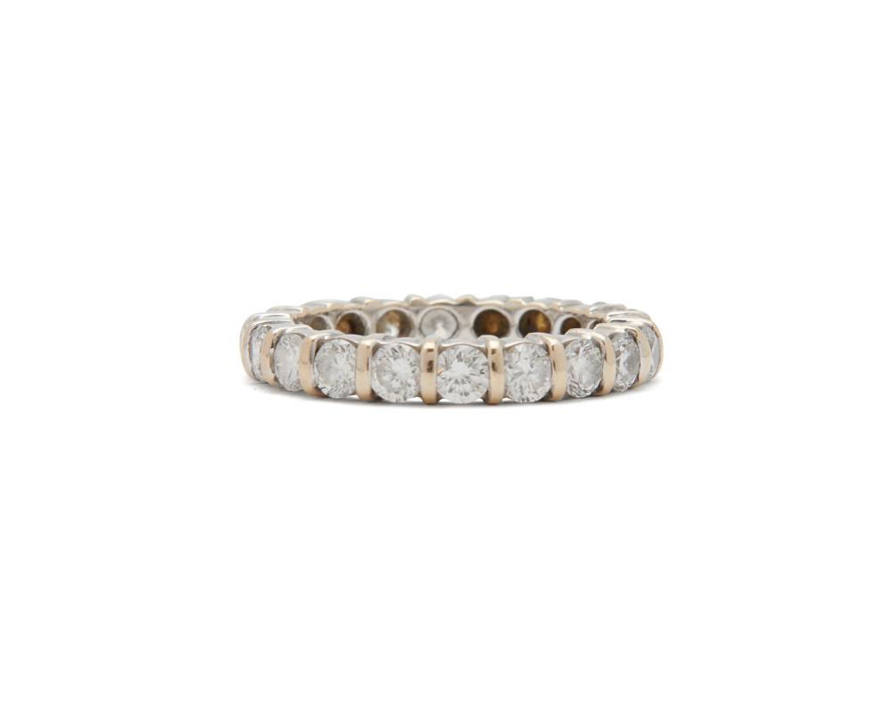 Appraisal: K Gold and Diamond Band the eternity band bar-set with