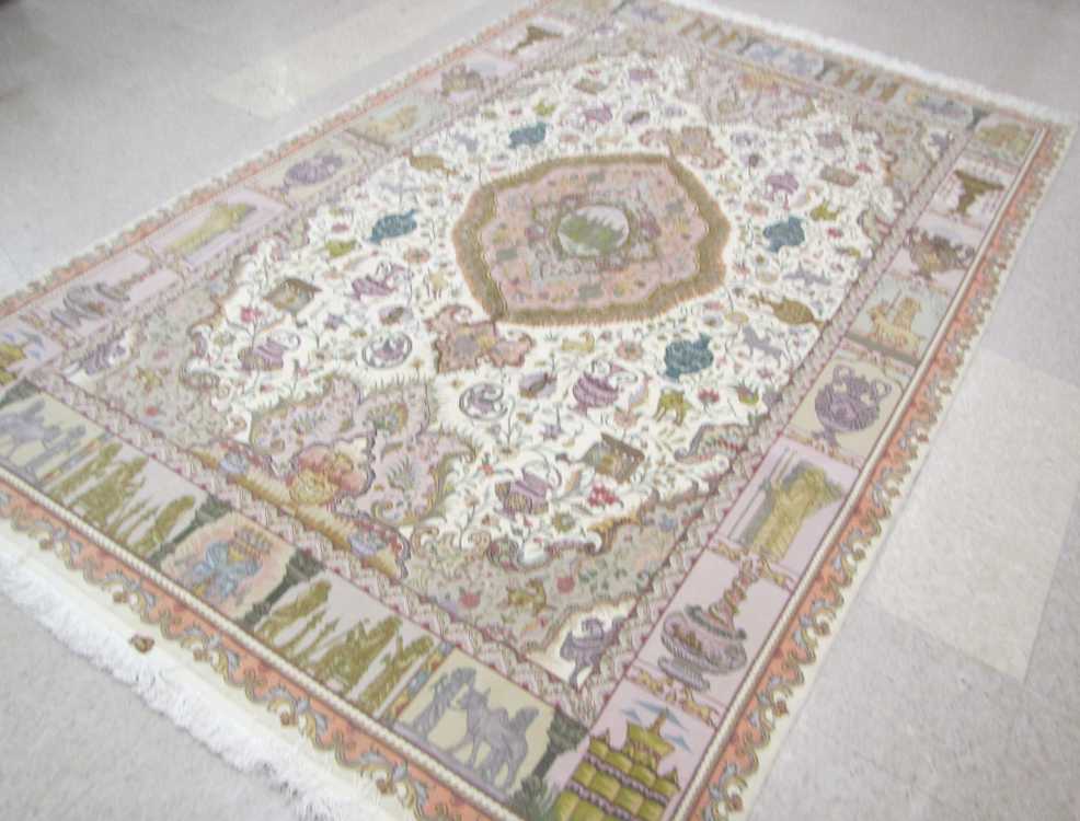 Appraisal: A CONTEMPORARY PERSIAN WOOL AND SILK CARPET hand knotted in