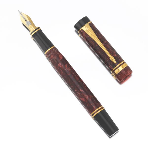 Appraisal: PARKER DUOFOLD CENTENNIAL MARBLED FOUNTAIN PEN Burgundy marble look caps