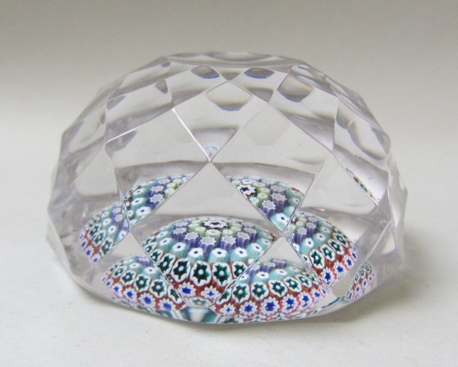 Appraisal: A Whitefriars faceted glass paperweight with Millefiori cane inclusions cm