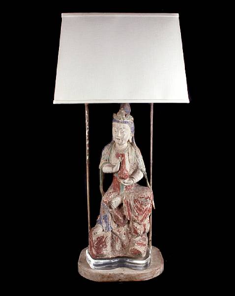 Appraisal: A pair of Asian polychrome decorated figures now as lamps