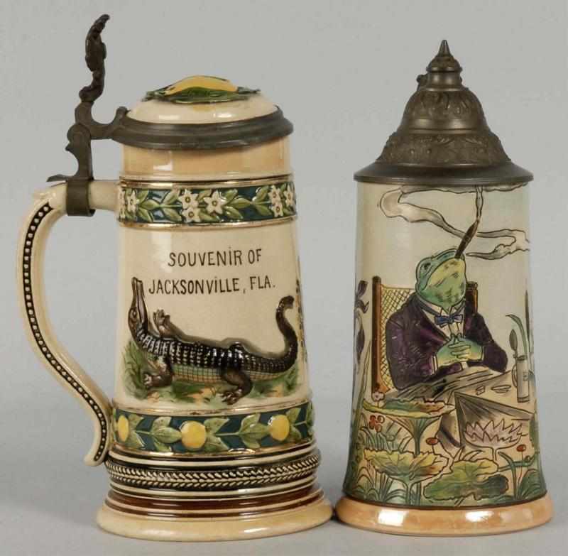 Appraisal: Lot of German Pottery Steins Description Both half-liters One depicting