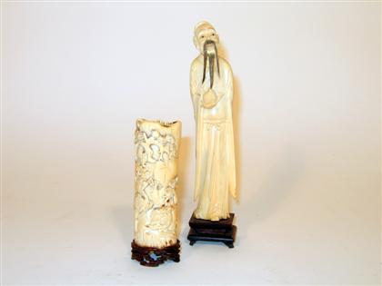 Appraisal: Chinese elephant ivory figure and bone or ivory brushpot th