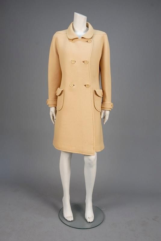 Appraisal: COURREGES PARIS WOOL COAT s Dark ivory double breasted style