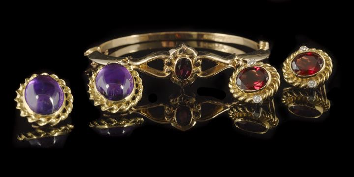 Appraisal: Group of Garnet and Amethyst Jewelry composed of an Edwardian