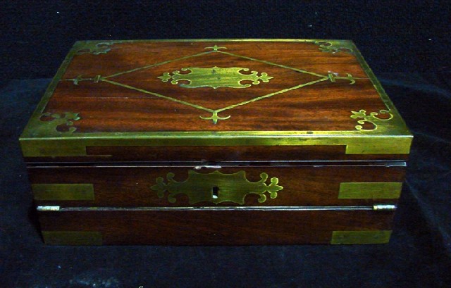 Appraisal: A th century English mahogany writing box inlaid with brass