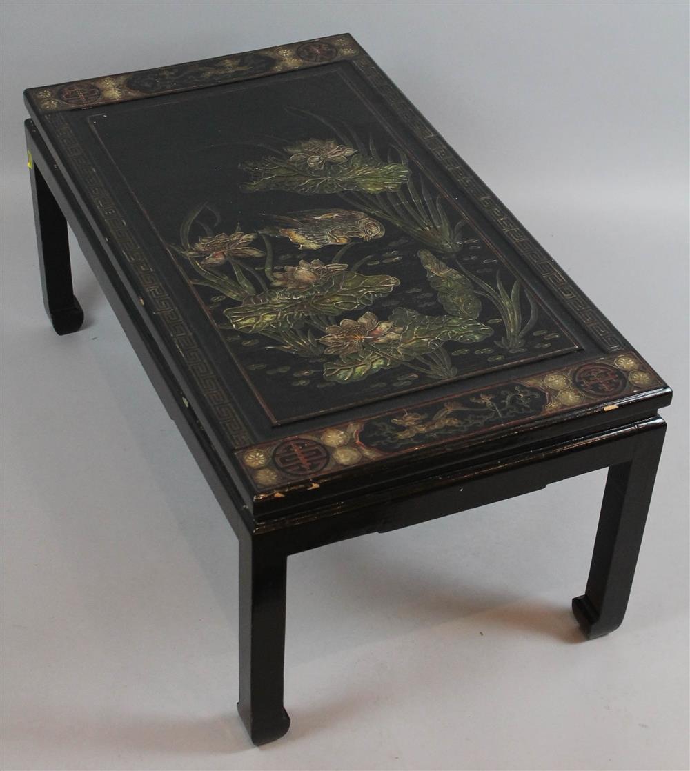 Appraisal: ASIAN LOW BLACK LACQUER CARVED COFFEE TABLE rectangular form the