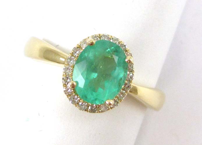 Appraisal: EMERALD DIAMOND AND FOURTEEN KARAT GOLD RING with round single-cut