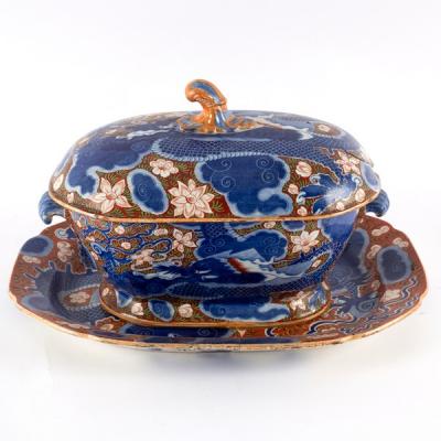 Appraisal: A pearlware soup tureen cover and stand painted flowers dragons