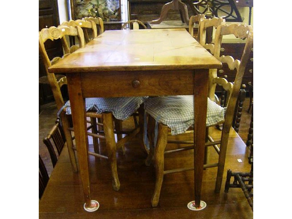 Appraisal: A th century cherrywood continental kitchen table of rectangular form