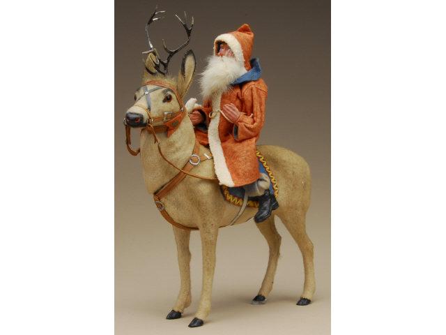 Appraisal: Santa on Reindeer Candy Container Germany ca figure has painted