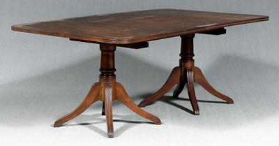 Appraisal: Cuban mahogany dining table Regency style with two pedestals heavy