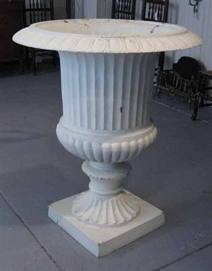 Appraisal: Four painted iron classical style garden urns Of oversized campana