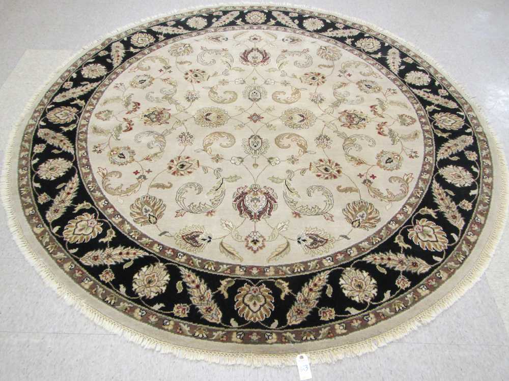 Appraisal: A ROUND ORIENTAL CARPET Indo-Persian overall floral raceme design on