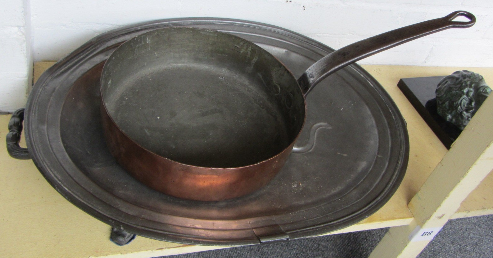 Appraisal: A Victorian pewter meat platter with warmer base and tree