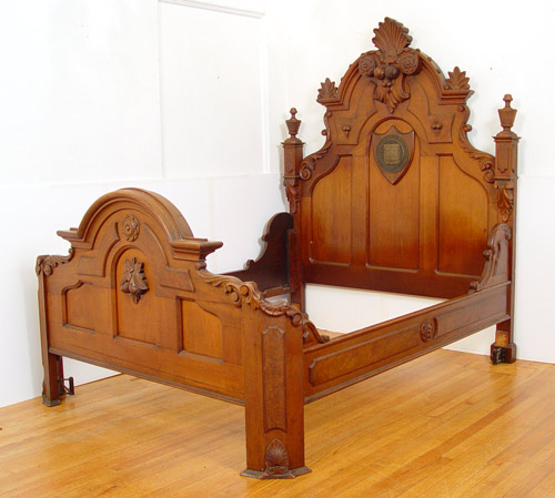 Appraisal: YALE UNIVERSITY CARVED WALNUT BED Carved walnut with crest and