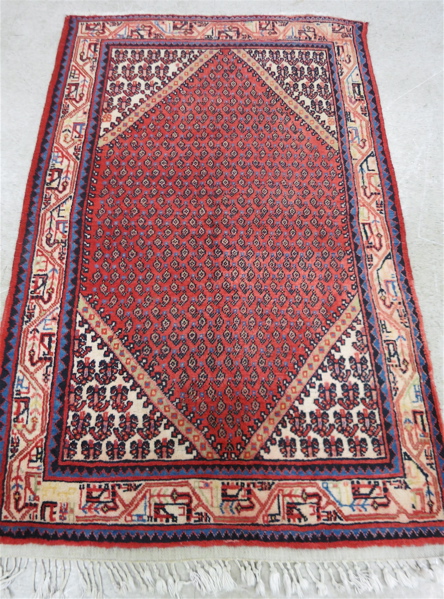 Appraisal: PERSIAN MIR SERABAND AREA RUG hand knotted in an overall