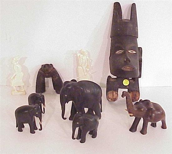 Appraisal: African Asian carvings including five wooden elephants and two bone