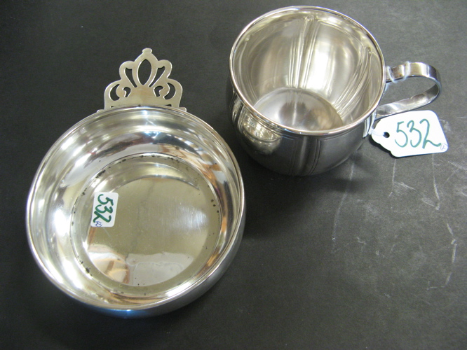 Appraisal: TWO STERLING SILVER CHILDREN'S ITEMS One is a hand chased