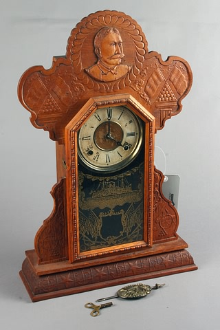 Appraisal: E Ingraham Oak Mantel clock Spanish-American War theme day time