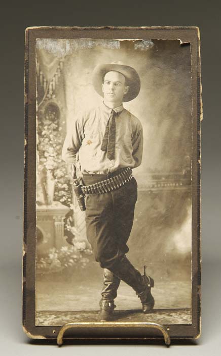 Appraisal: PHOTOGRAPH ON CARDBOARD OF A YOUNG TEXAS RANGER The Ranger