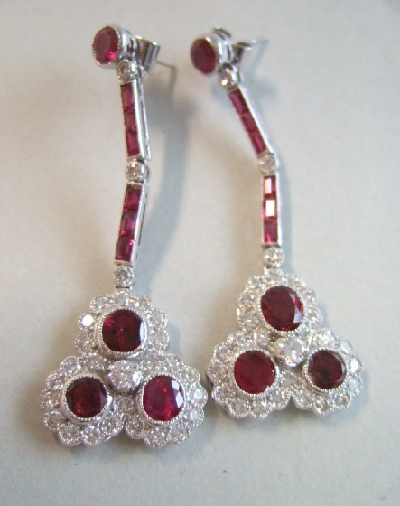 Appraisal: A pair of ruby and diamond set pendant earrings each