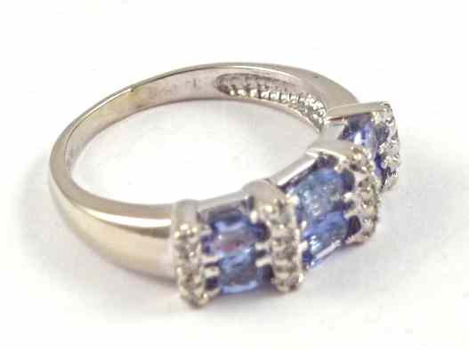 Appraisal: TANZANITE AND DIAMOND RING k white gold set with six