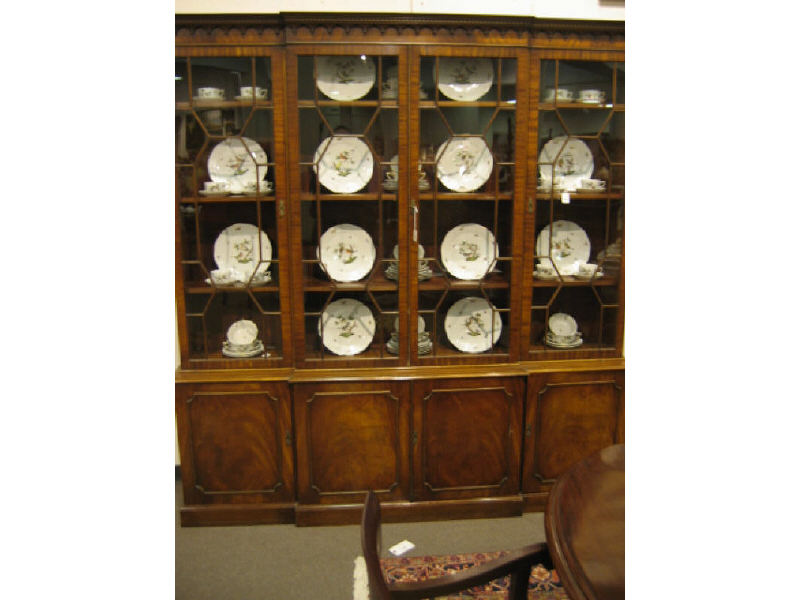 Appraisal: PAIR ENGLISH REGENCY STYLE MAHOGANY BOOKCASES The cornice with dentil