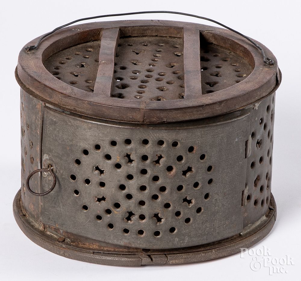 Appraisal: Unusual circular tin and walnut footwarmer Unusual circular tin and